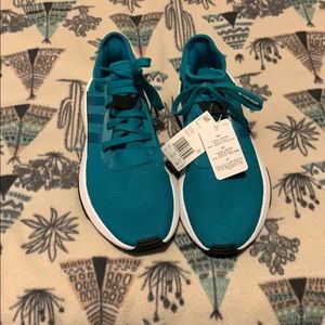 Men’s adidas shoes.